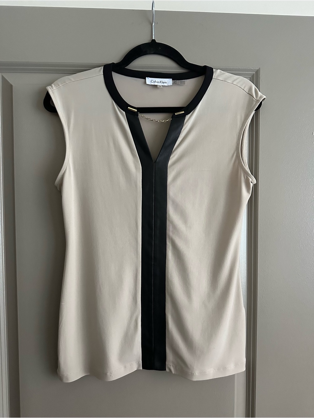 Calvin Klein Cream Sleeveless V-Neck Top with Black Trim and Center Stripe